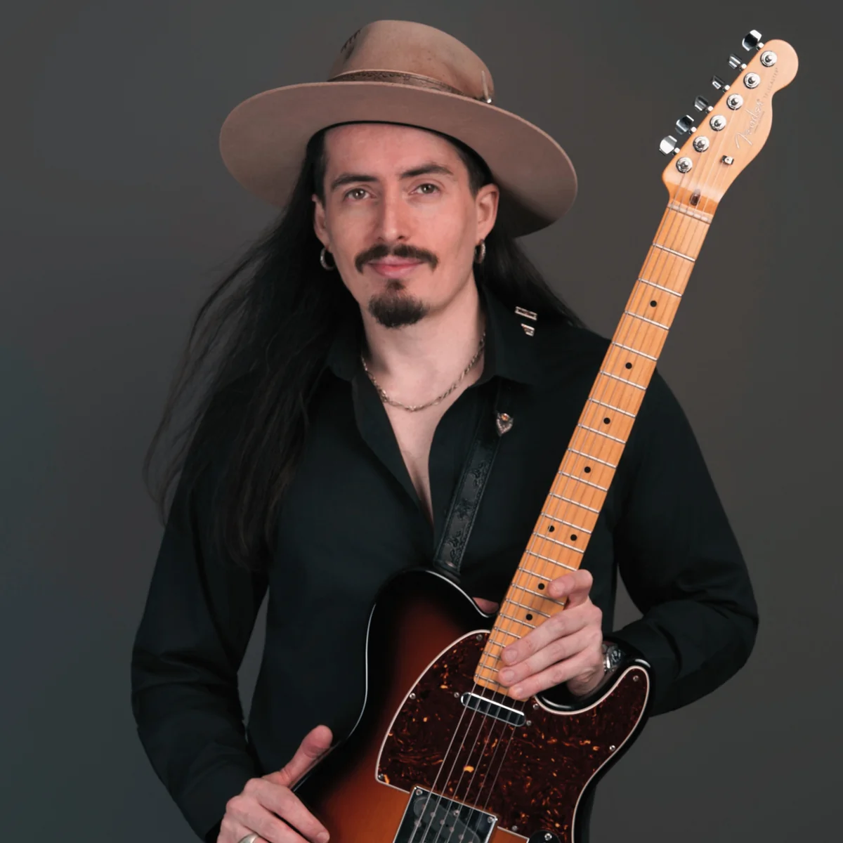 Behind the scenes image of Rud Wolf contributing guitar to Where Is The Peace.